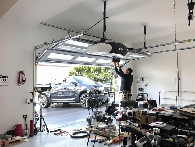 Brea Garage Door Repair specialist installing smart garage door opener system in Brea home