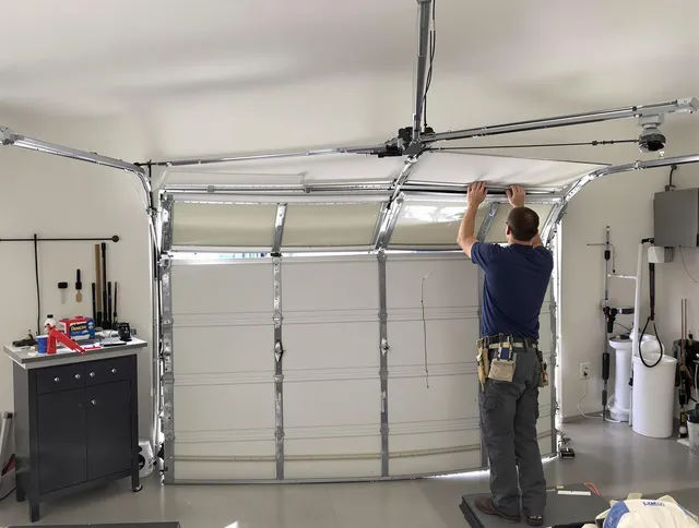Brea Garage Door Repair specialist performing precise section replacement on Brea garage door