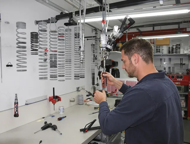 Brea Garage Door Repair safety certified technician performing precision spring replacement in Brea
